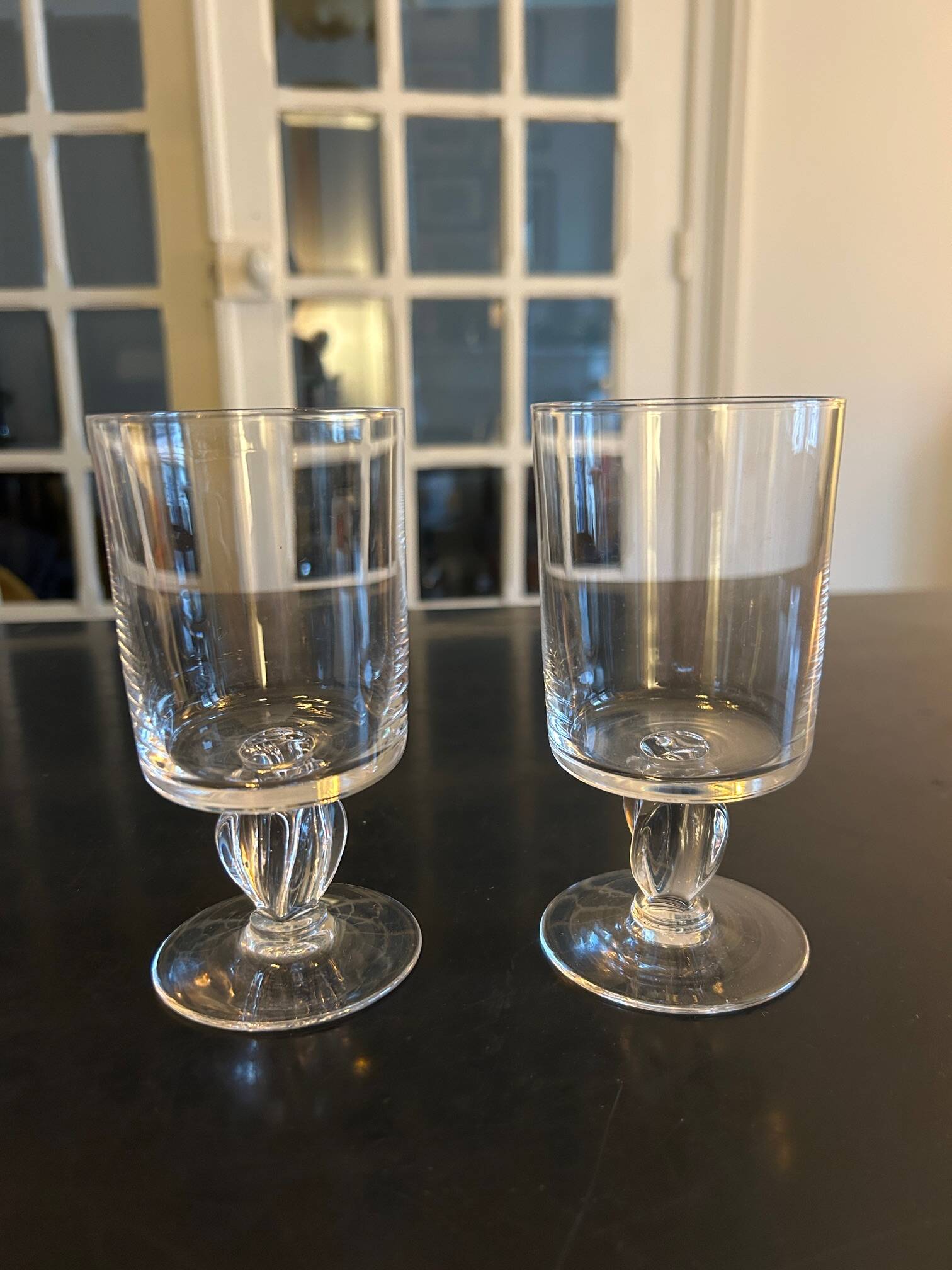 10 old glasses with twisted stems