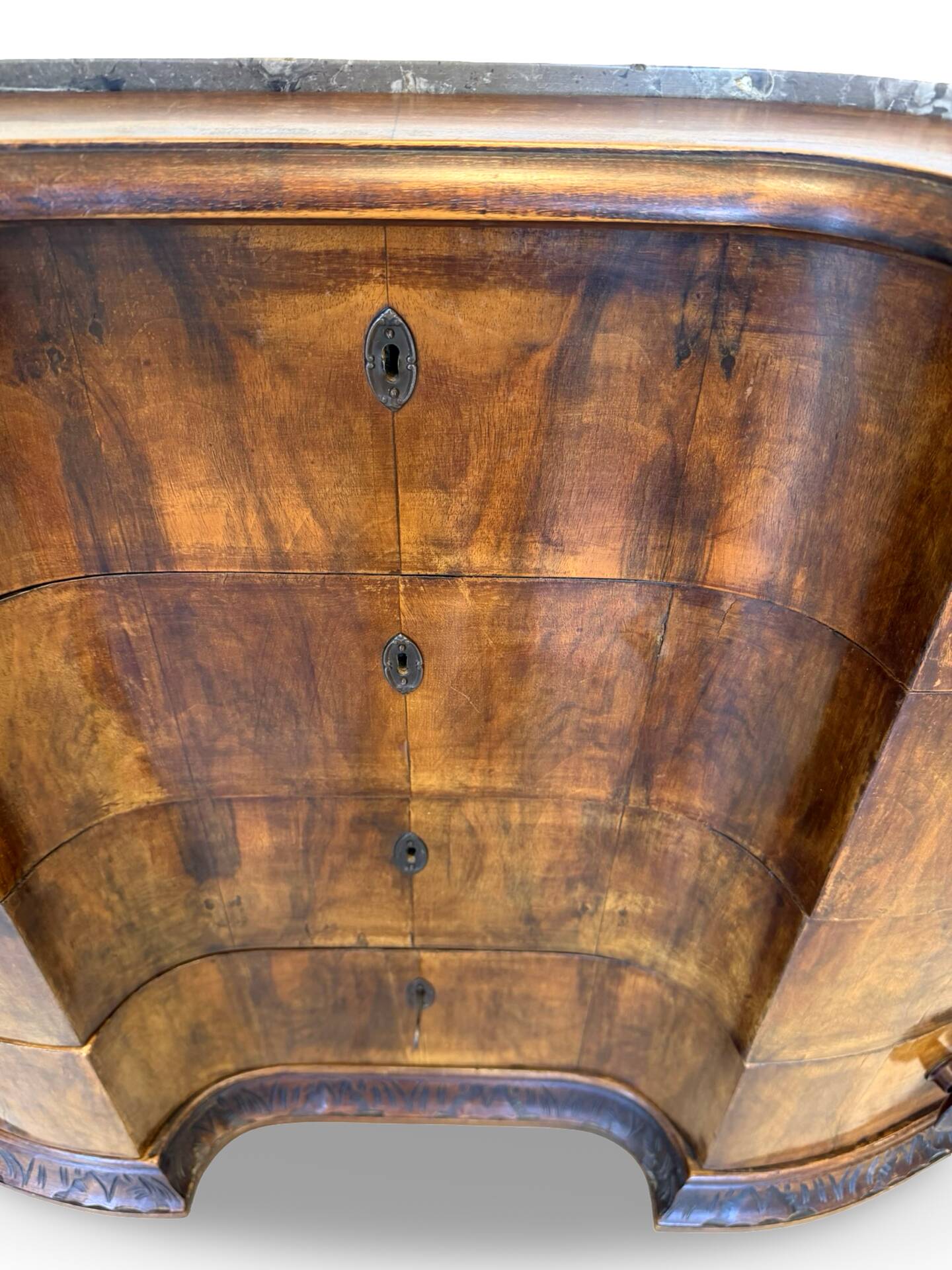 serpentine commode in antique walnut