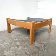 Modernist coffee table in solid pine with a reversible top, 1970s.