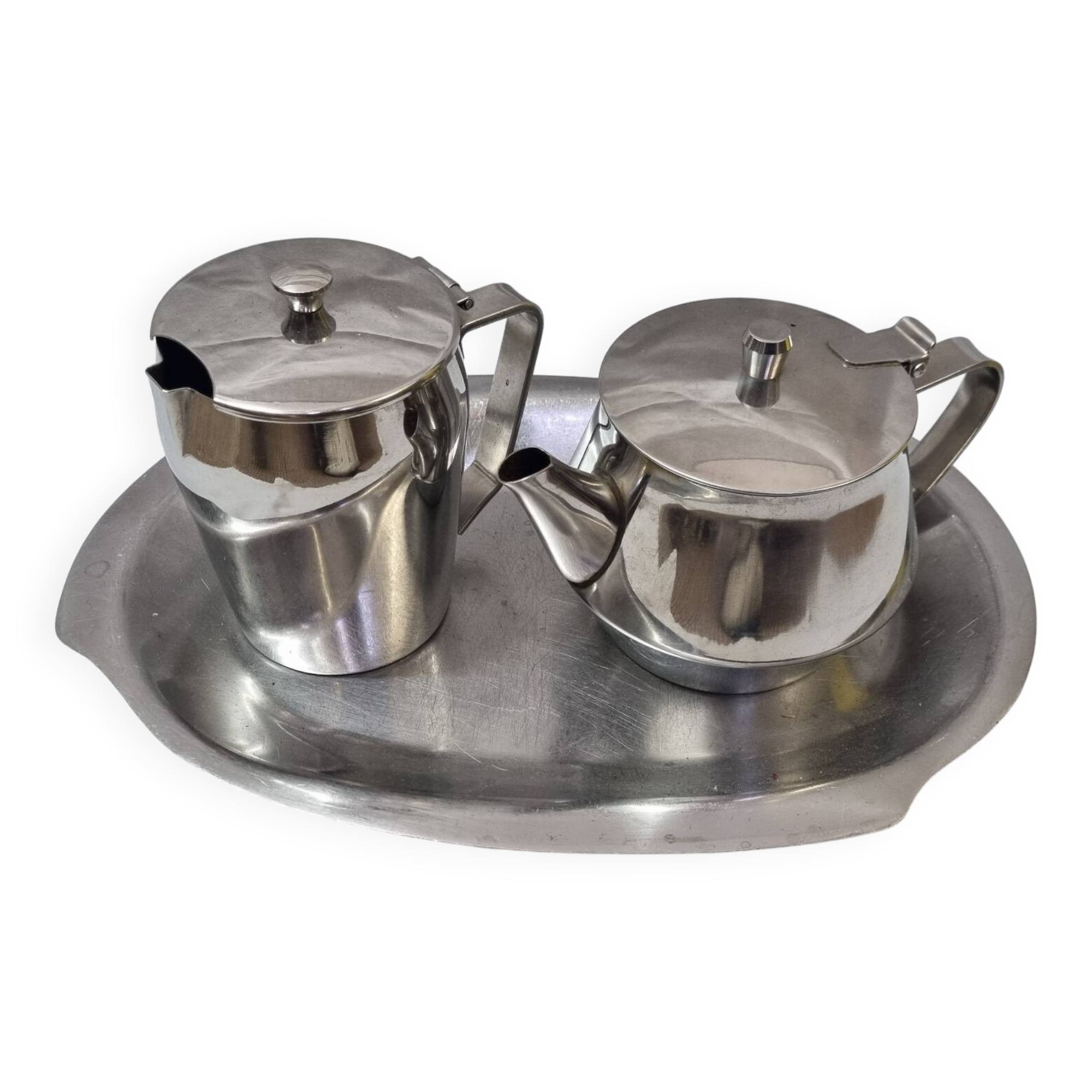 Stainless steel teapot and coffee pot from a boat, 1960