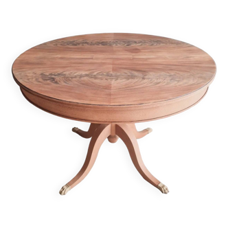 Round wooden table with extensions