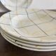 Vintage Longchamp France service – 18 graphic plates from the 1950s.