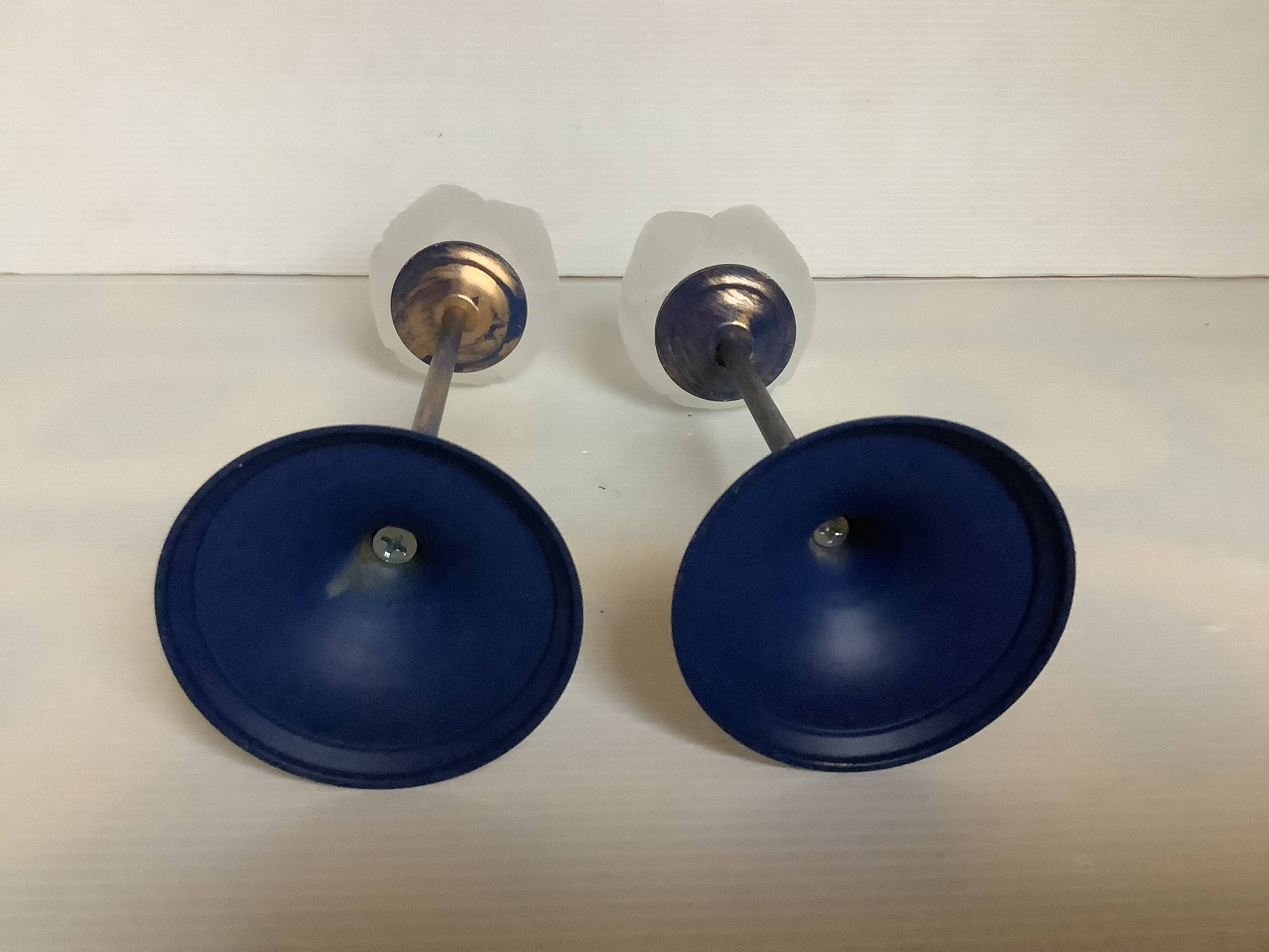 Pair of glass and metal flower candlesticks