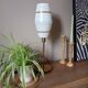 Mid-century gold metal table lamp with white striped shade