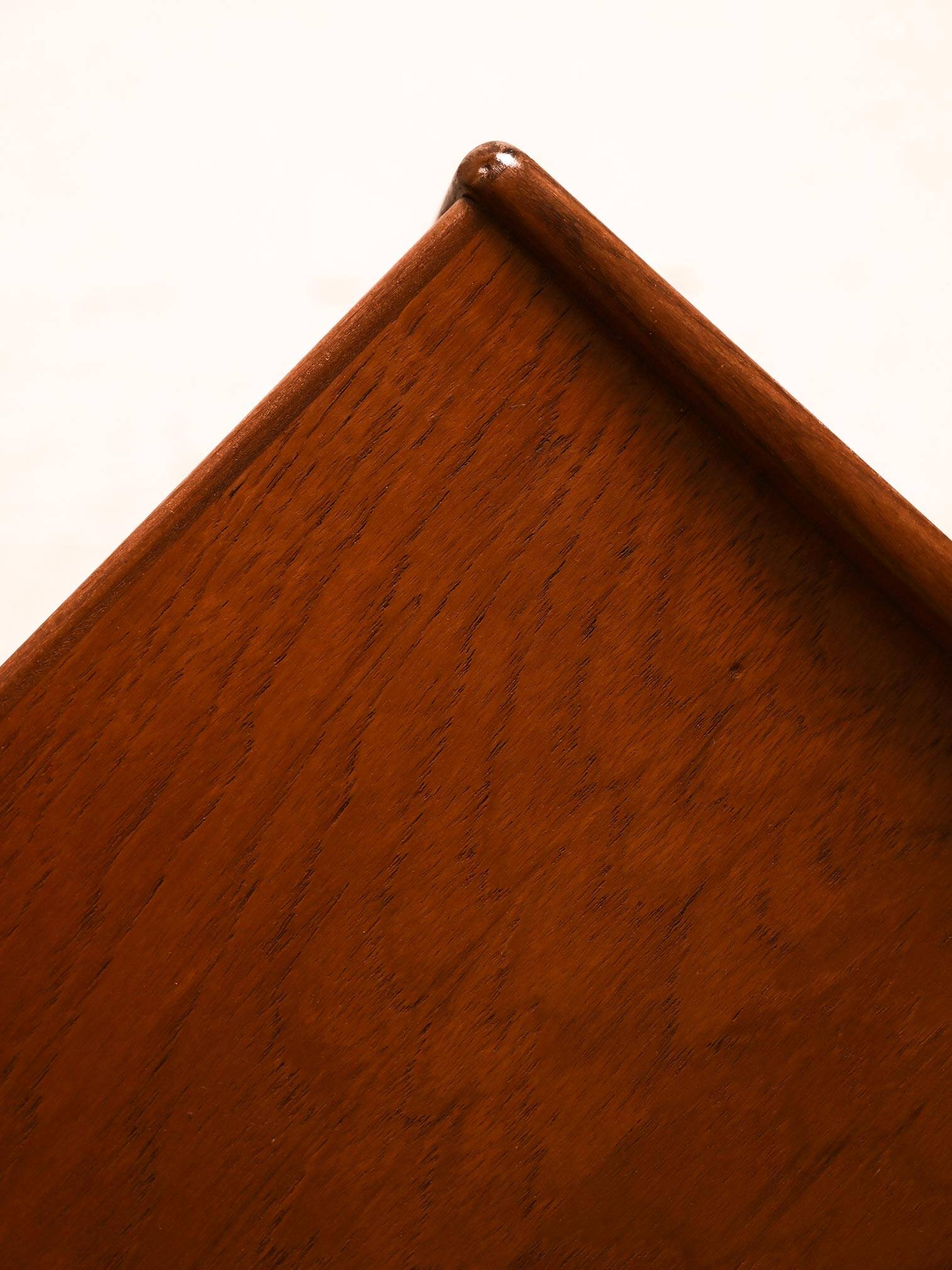 Bedside table with rattan magazine rack