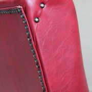 Vintage armchair in red leatherette