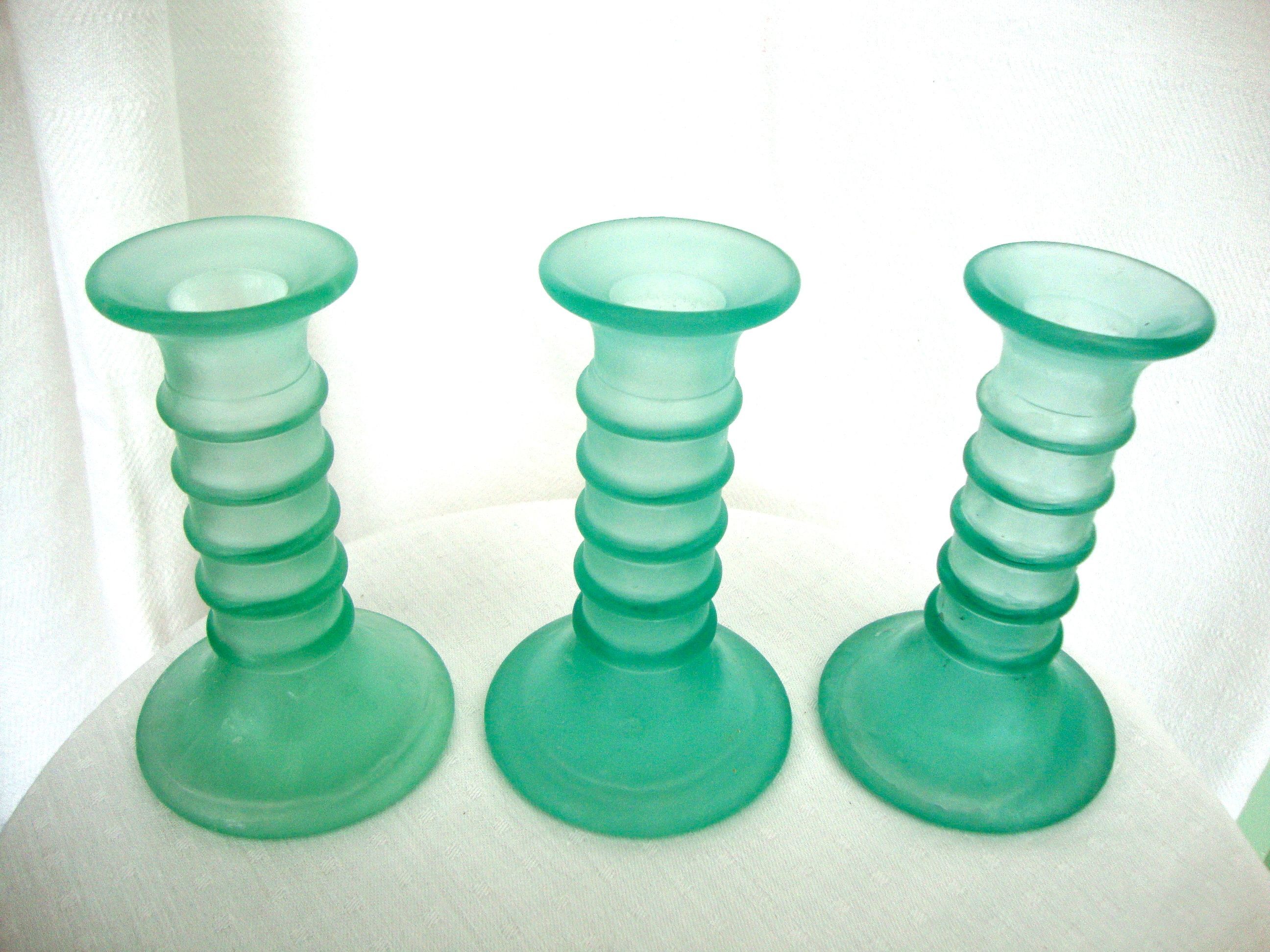 3 twisted glass candlesticks