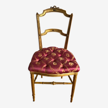 Louis XVI style chair in gilded wood