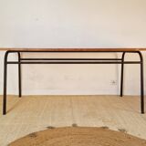 Metal tubular base table with a wooden top.