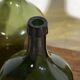 Antique green demijohns (circa 1920). Set of 3 pieces