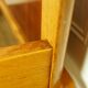 Daybed pieds compas en chêne doré et placage façon teck