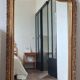 Antique Louis Philippe mirror with a pediment.