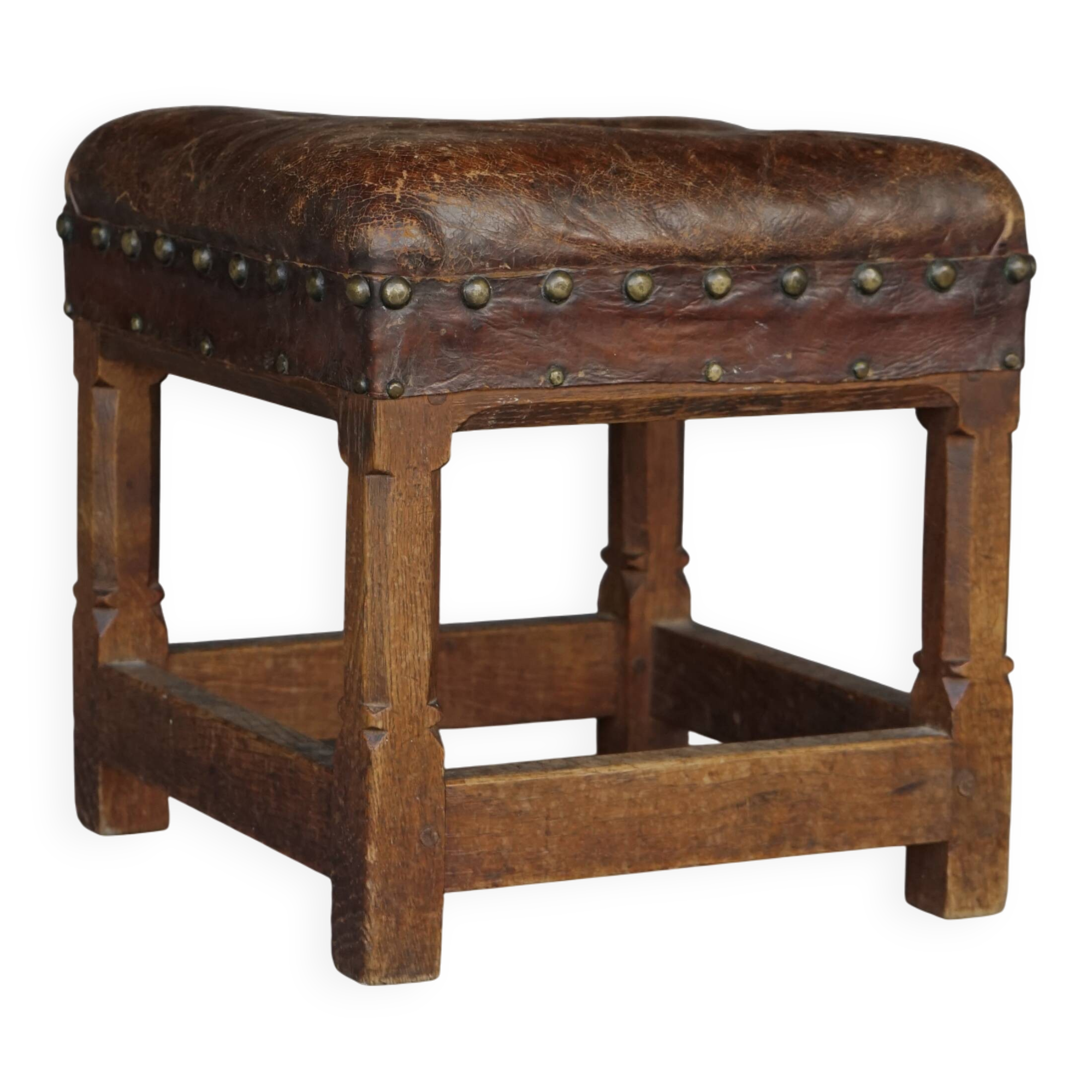 Petit tabouret en cuir par Gordon Russell pour Russell & Sons. Années 1920