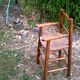 High wooden child chair, straw seating