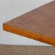 Square wooden dining table with a pedestal from the 1980s.