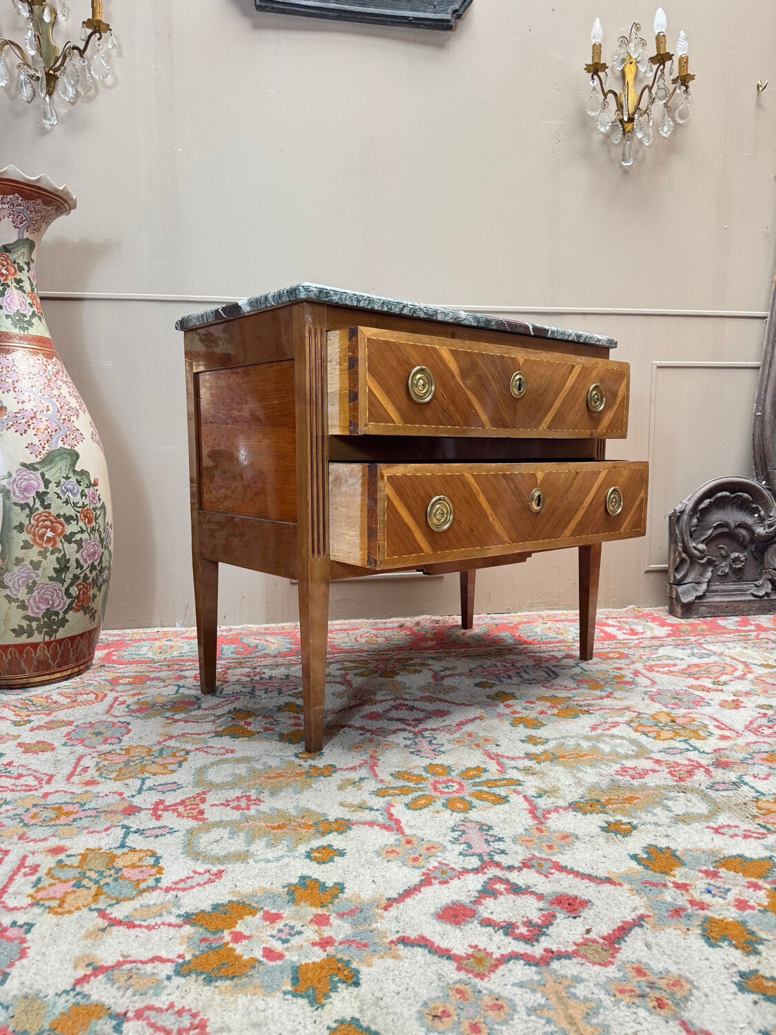 Louis XVI style commode in natural wood and marquetry, 19th century