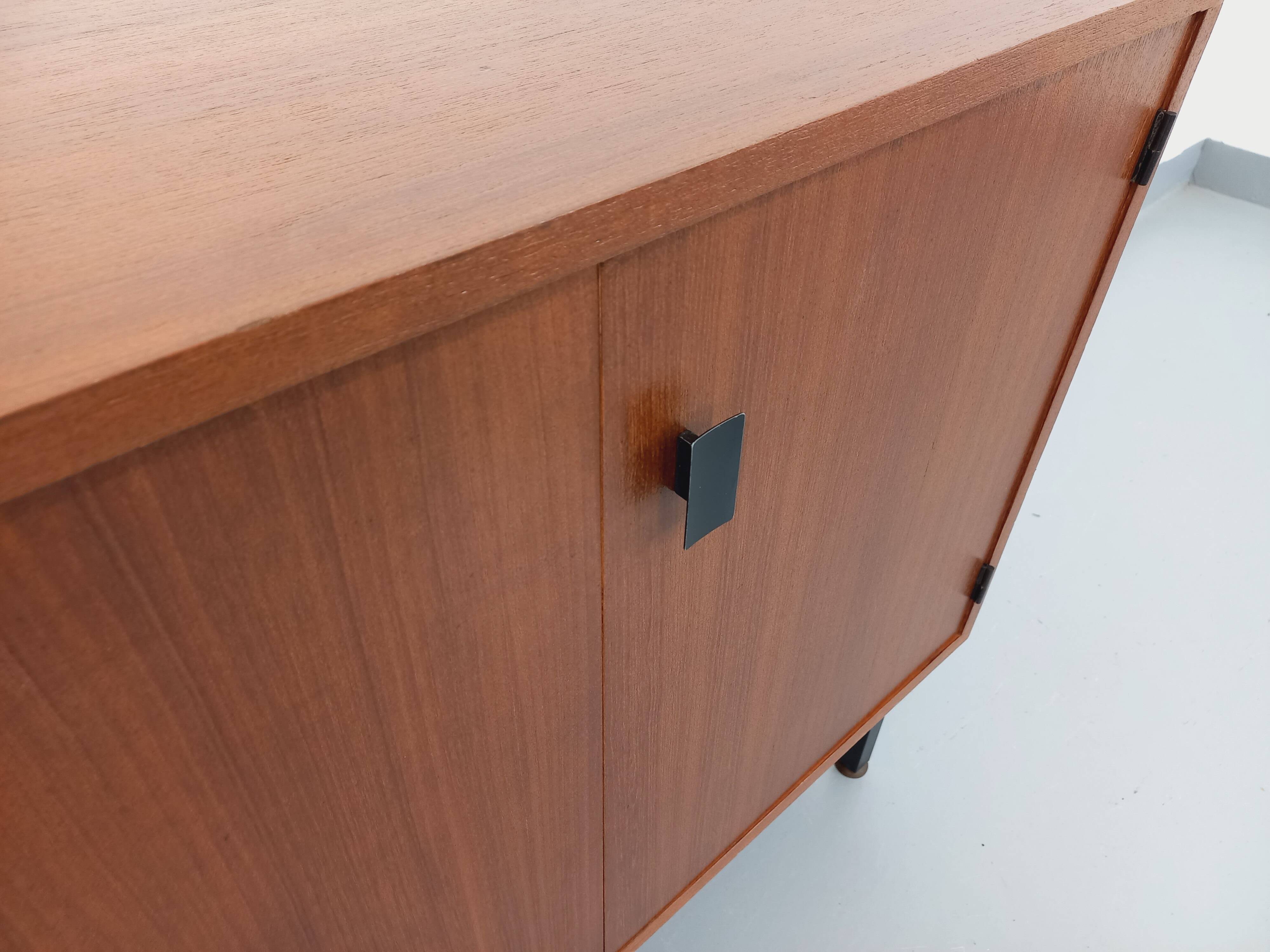 Small vintage storage unit in modernist Scandinavian style in teak from the 60s