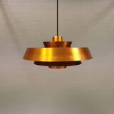 A mid-century Danish hanging lamp in copper by Jo Hammerborg for Fog & Mørup.