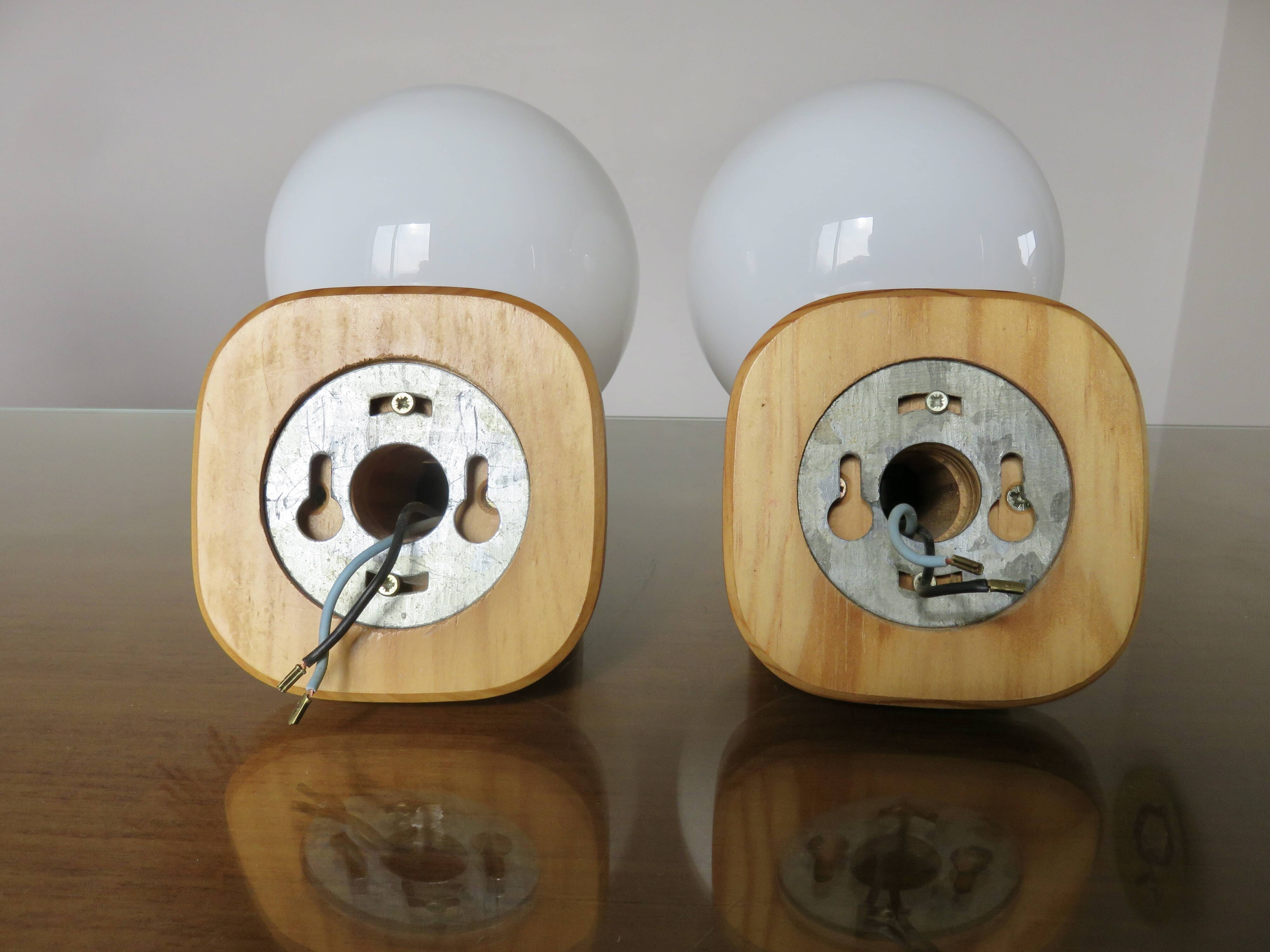 Pair of Scandinavian wall lights in pine and white opaline, 1980s.