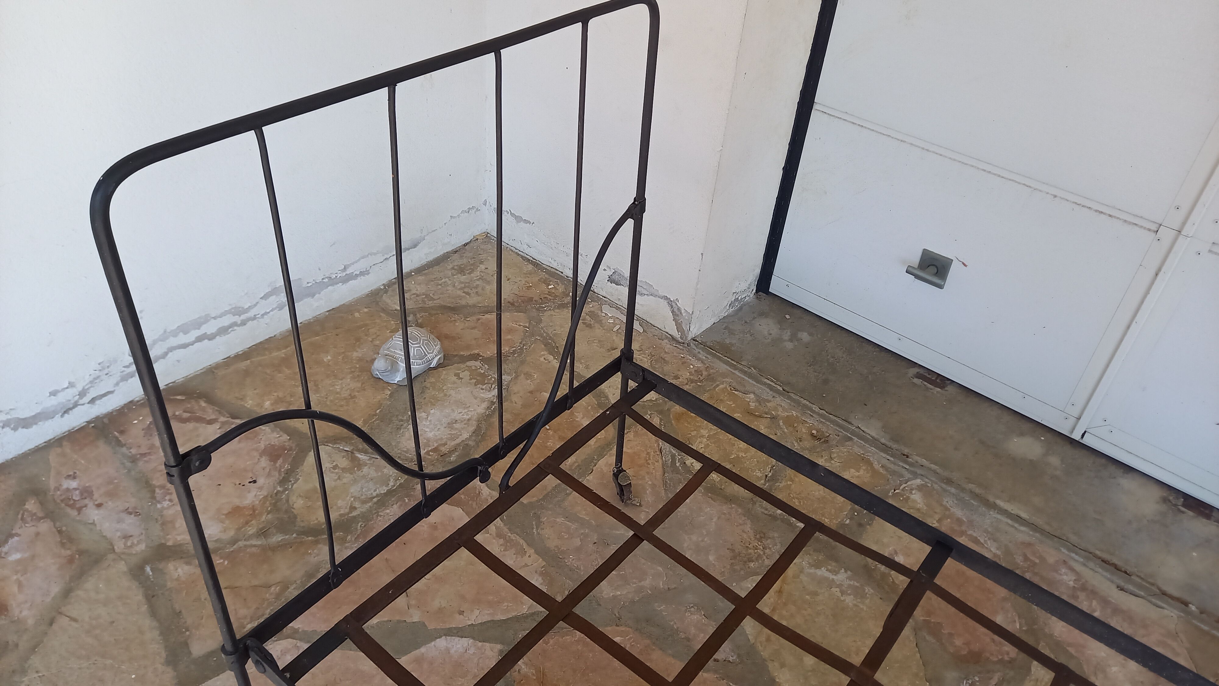 Wrought iron bed with mattress