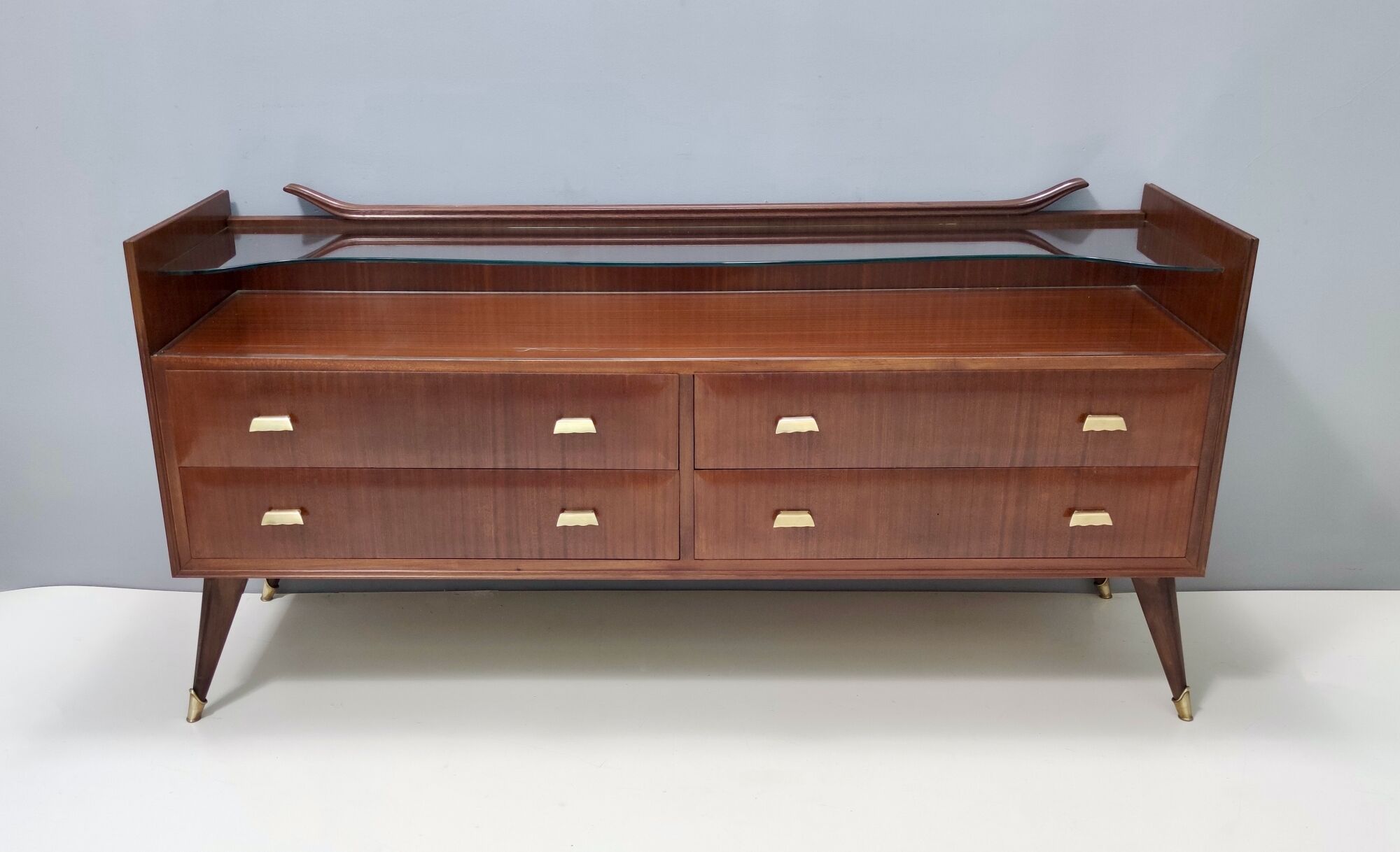 Walnut dresser with a thick glass top, italy