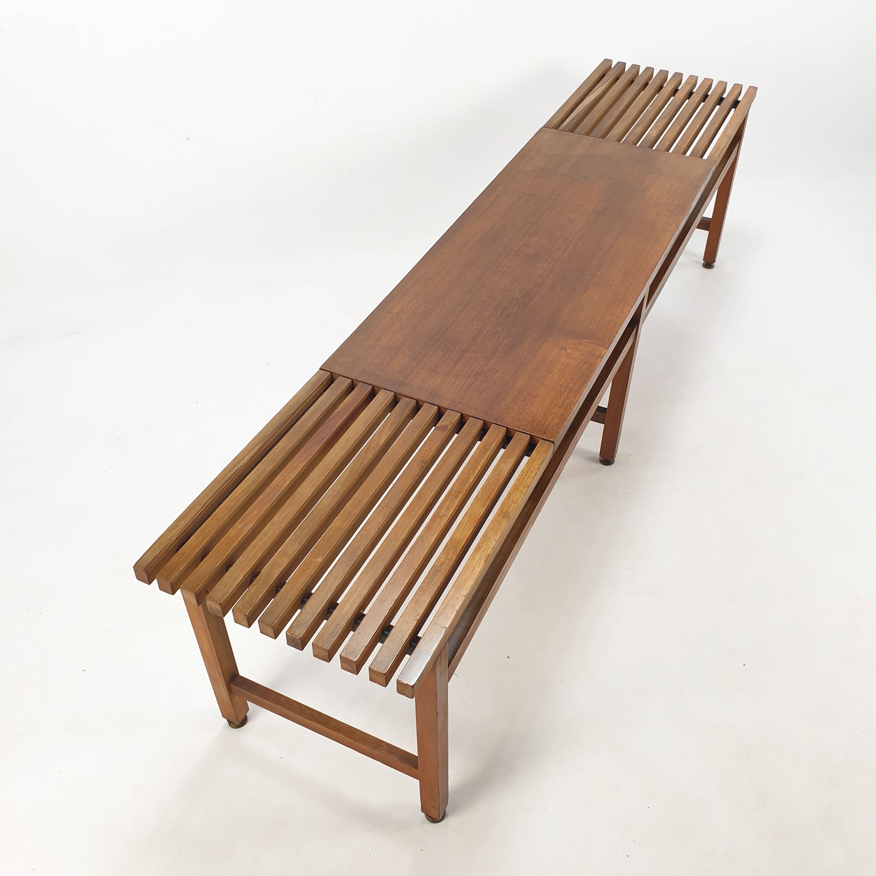 Bench in walnut and teak with brass feet, italy 1950s