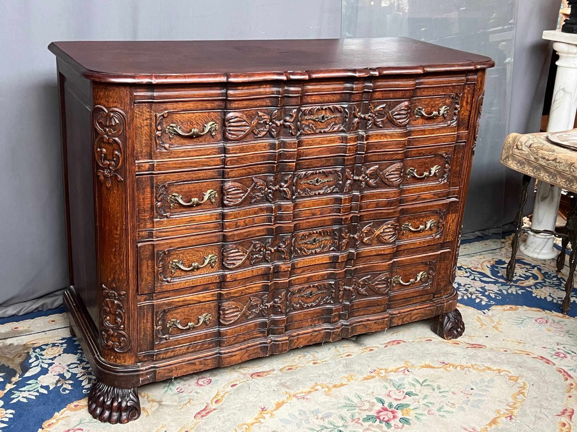Luxurious carved Neo-Renaissance chest of drawers.
