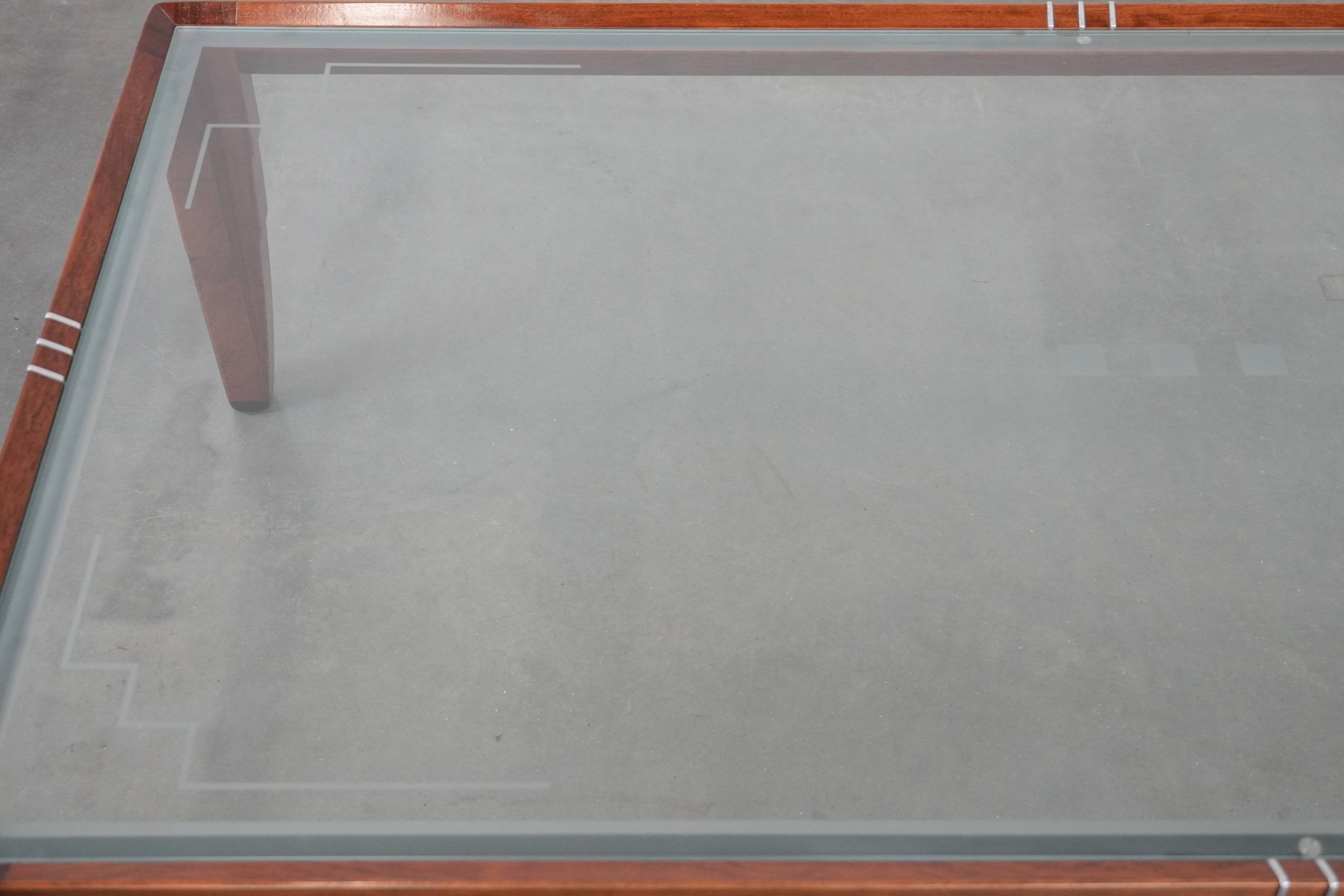 Beautiful Art Deco design coffee table with a glass top