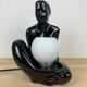 Black ceramic lamp and opal globe