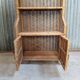 Vintage rattan wicker library in Emmanuelle style