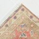 Tapis persan ancien noué main rouge corail, médaillon central floral