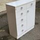 White, glossy lacquered wooden chest of drawers from the 1980s