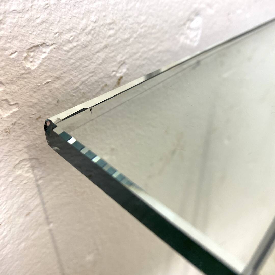 Minimalist glass and metal desk from the 1970s