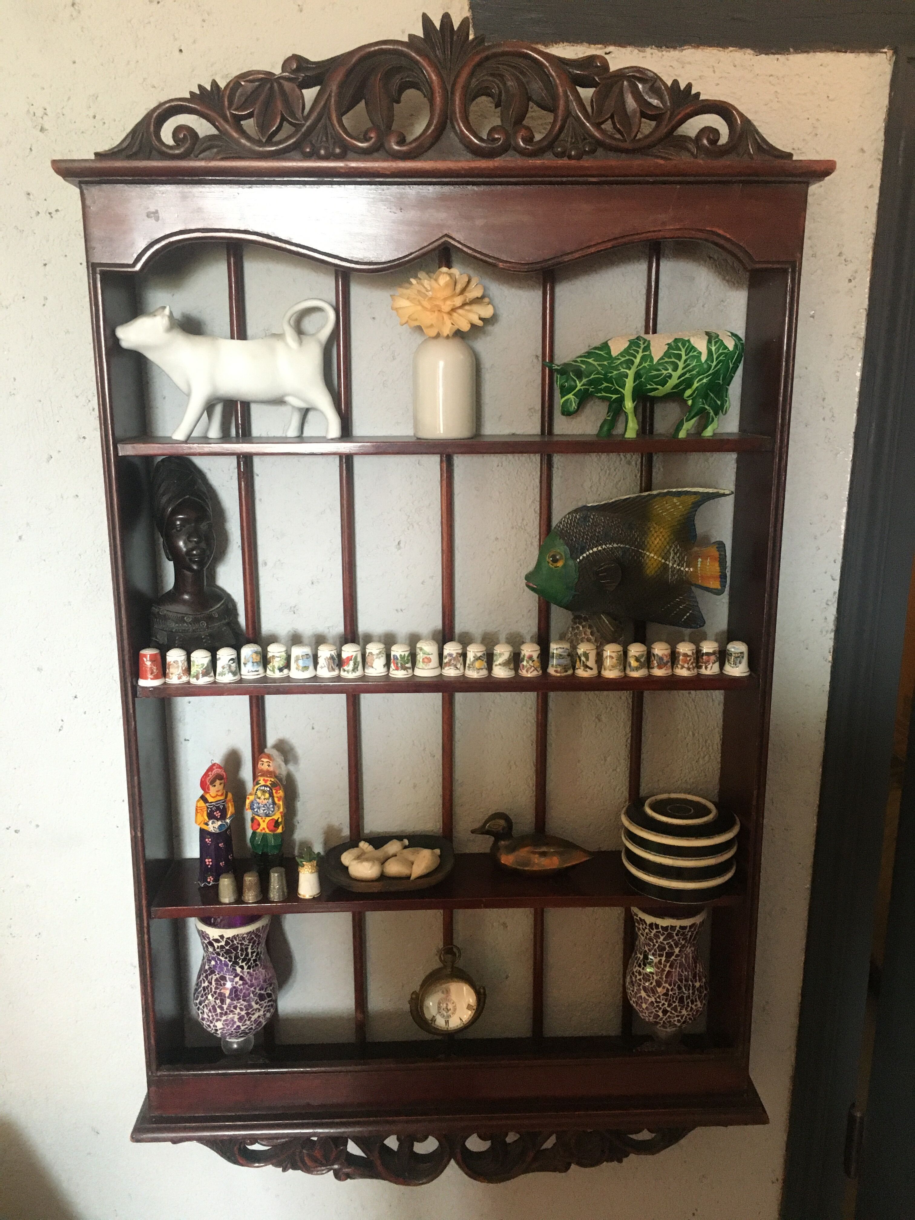 Carved wooden wall shelf for collection or other.