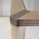 Side table in gold metal and glass - 70s/80s