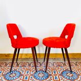 Pair of chairs red rug