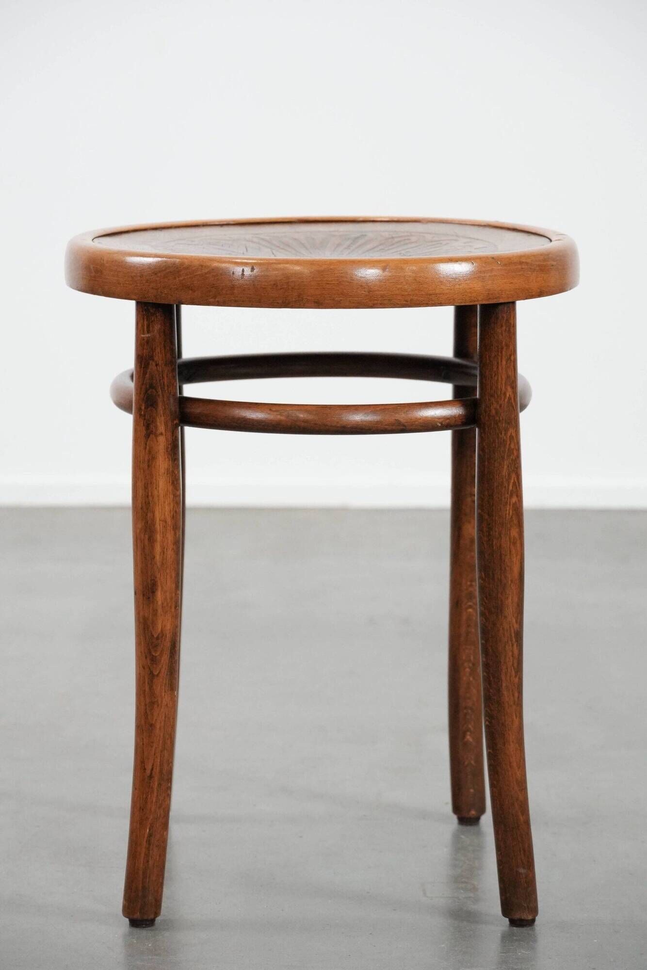 Antique bentwood stool from early 1900s with a seat with beautiful details
