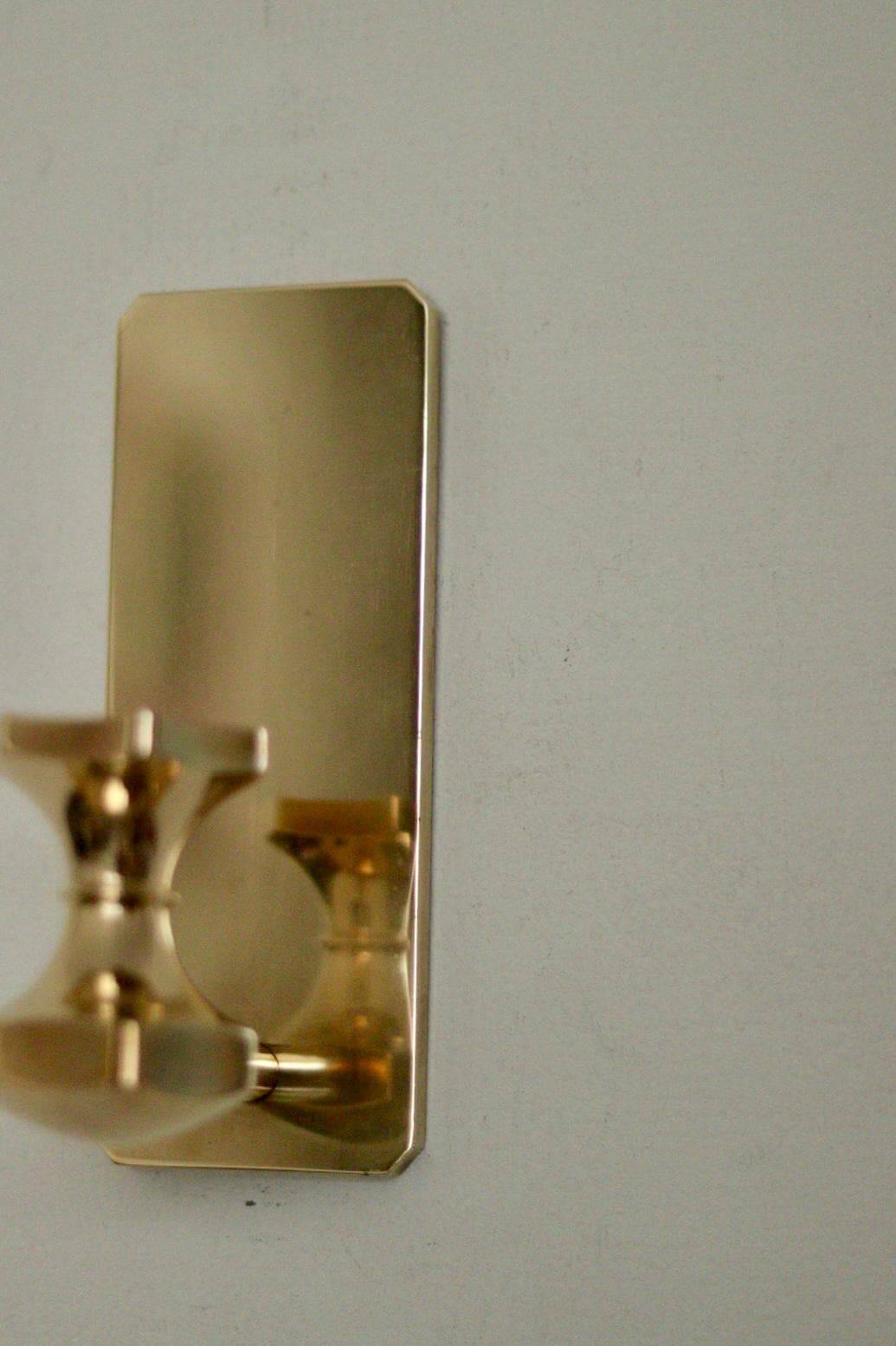 1988, single mid-century Swedish brass sconce by Gusum