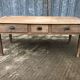 Antique solid cherry farm table with 3 front drawers.