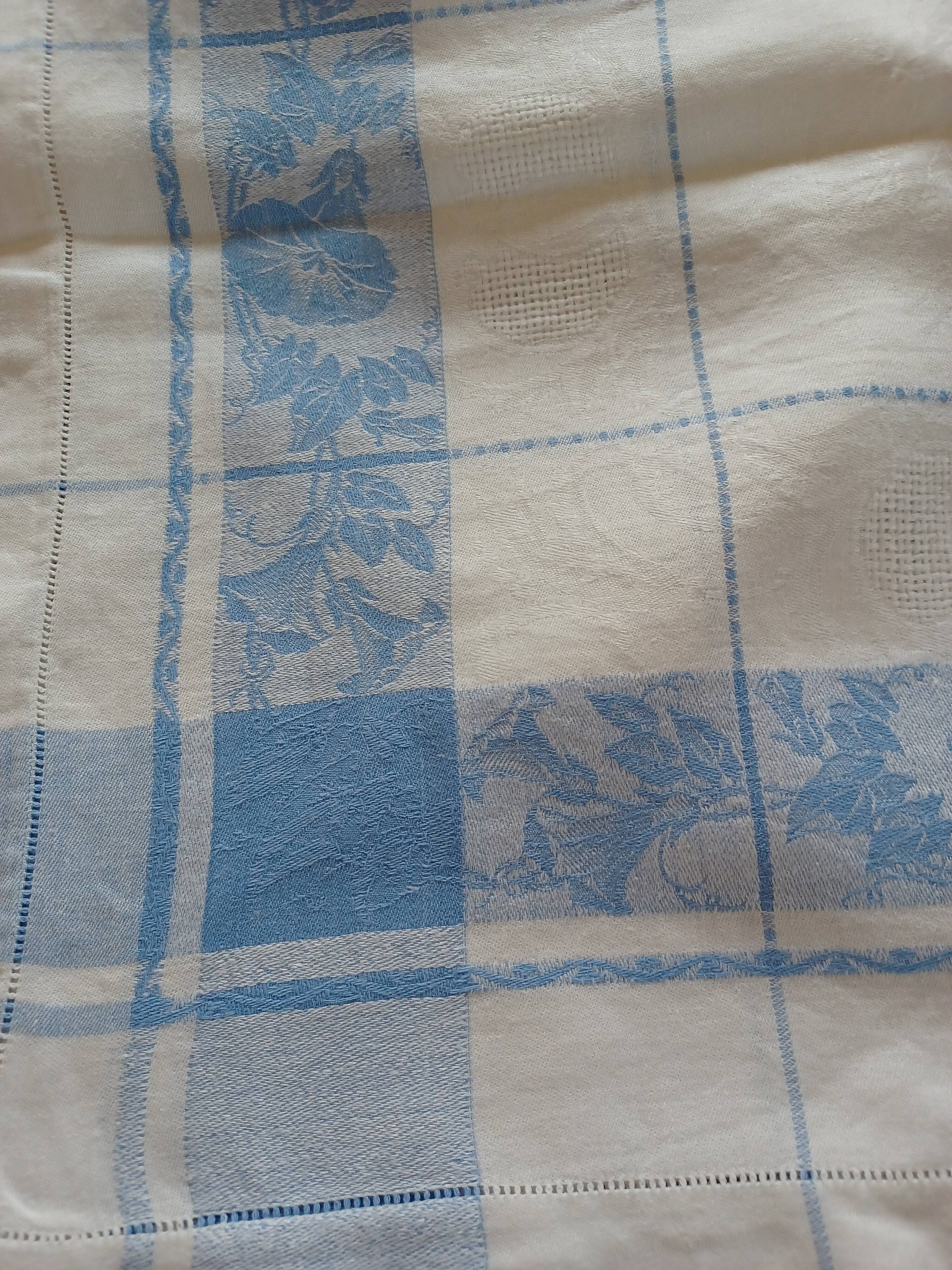 White and sky blue damask tablecloth and 10 towels