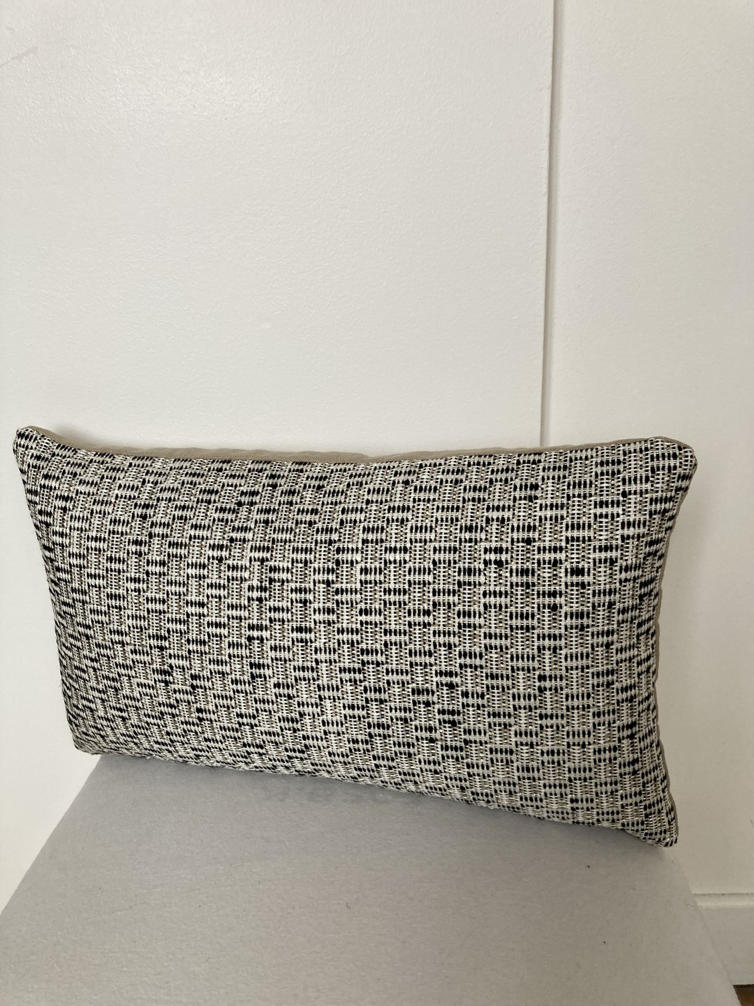 Bi-sided cushion beige black white pattern