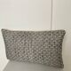 Bi-sided cushion beige black white pattern