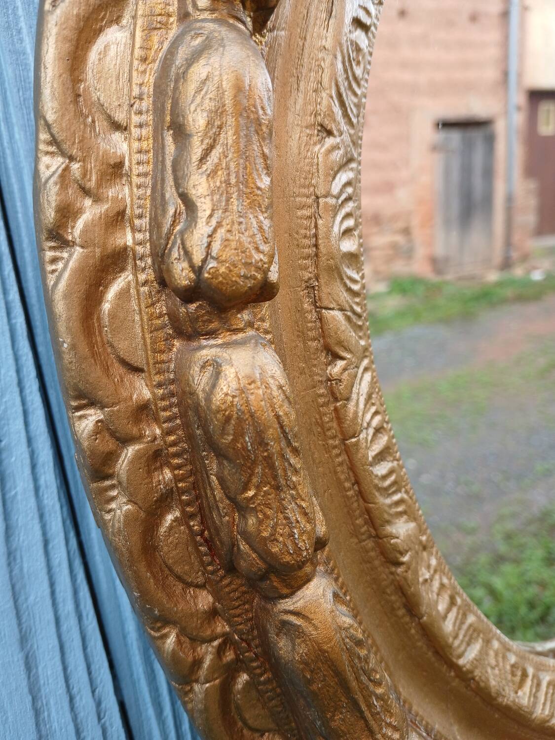 Miroir ancien en bois doré