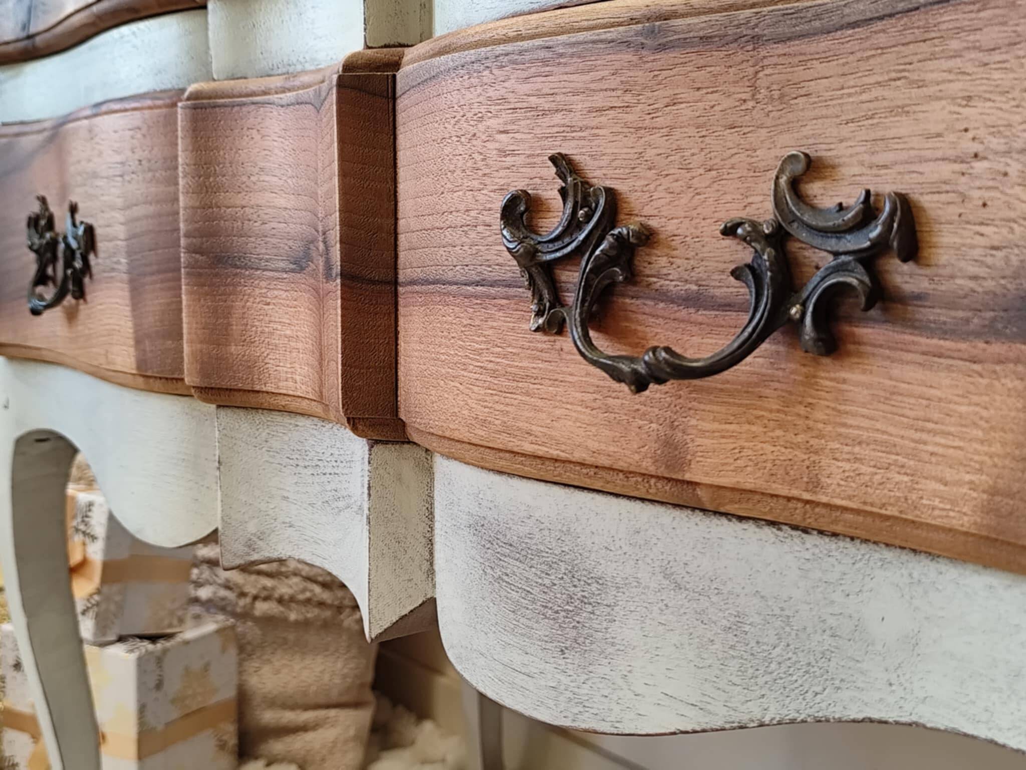 Walnut crossbow chest of drawers