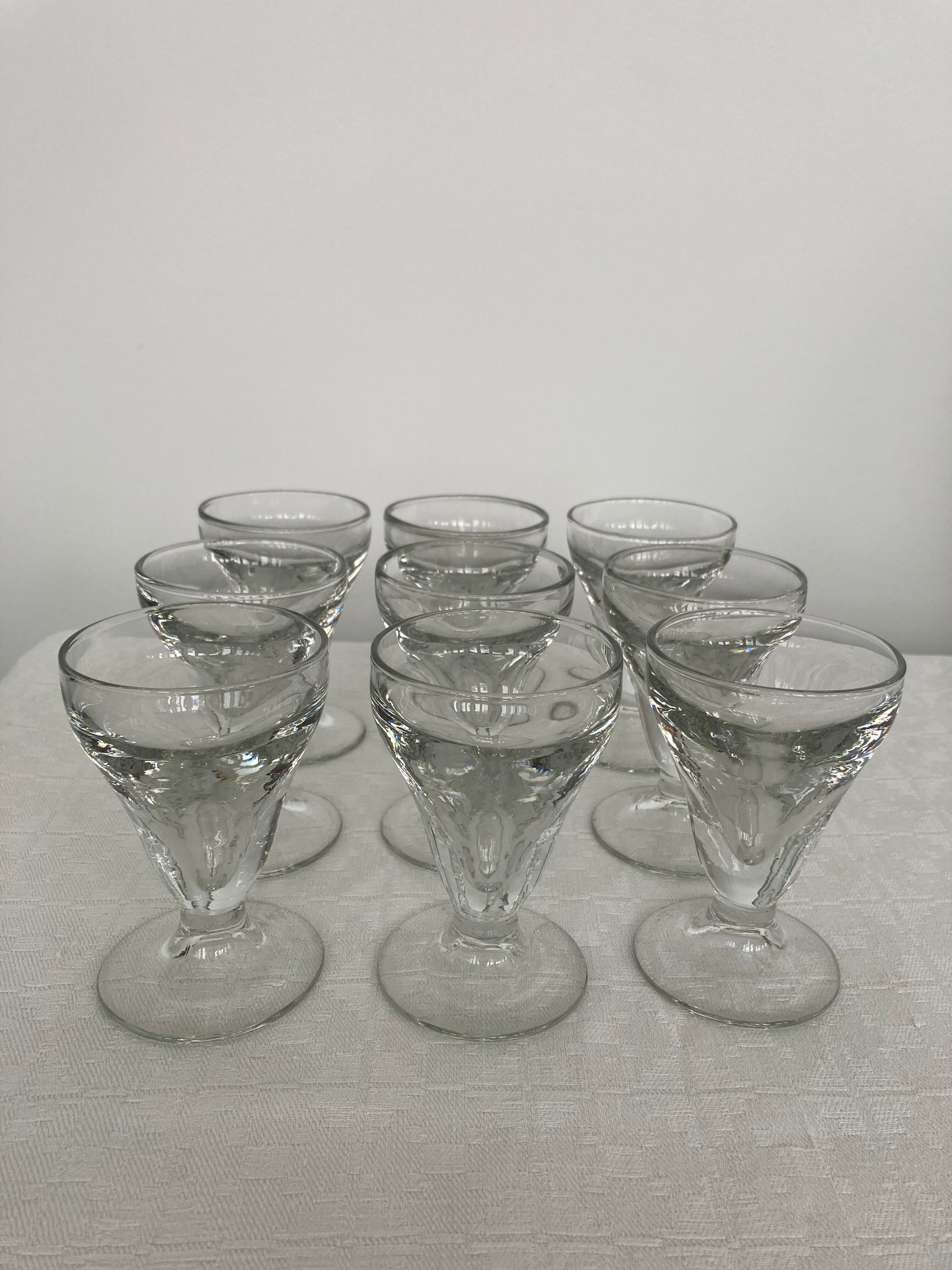 Set of 9 old glasses thick conical bottom