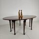 Antique English drop-leaf dining table – Victorian – 8 legs – oval shape – seats 8