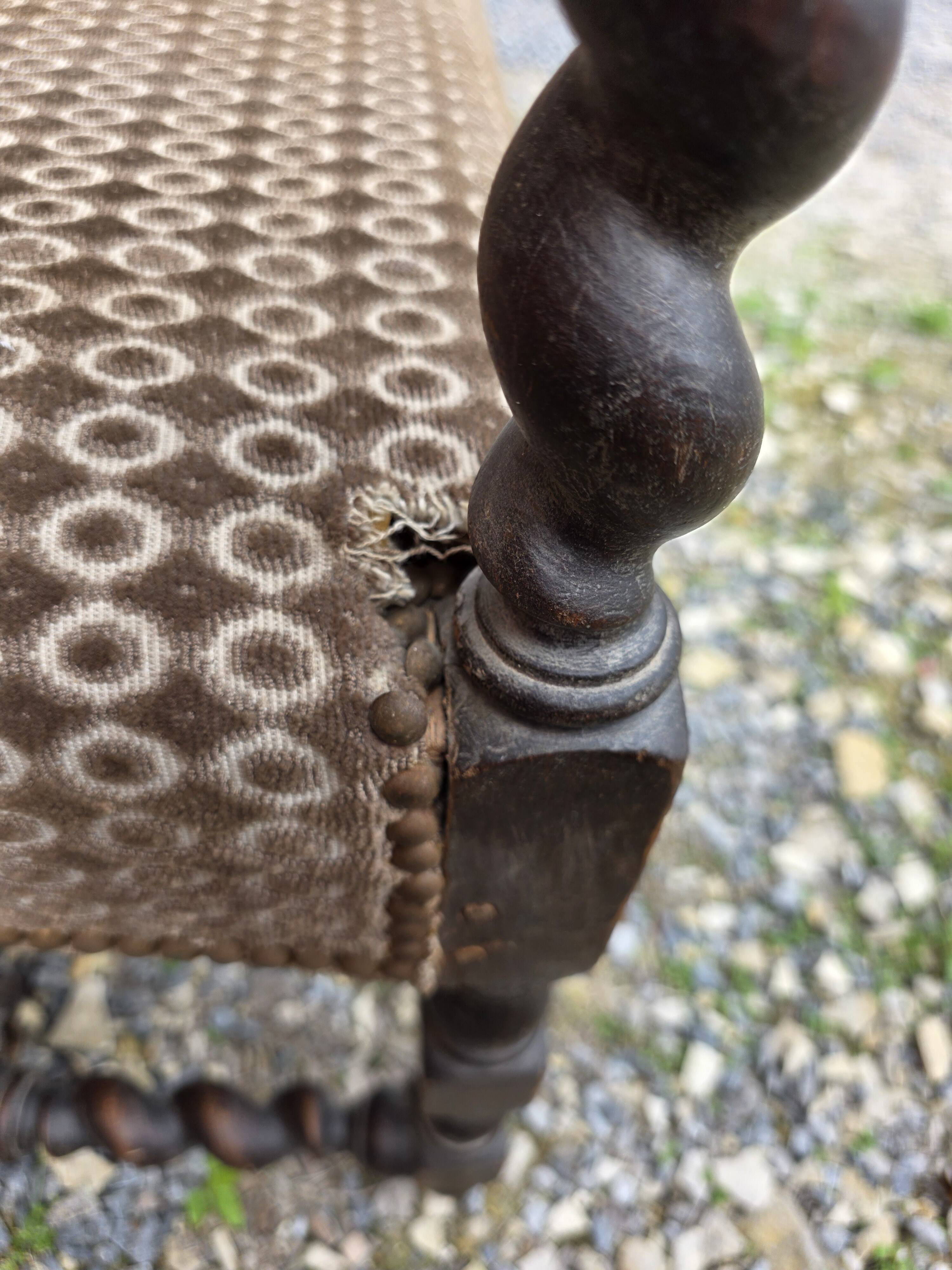 Three-seater armchair in Louis XIII style made of oak from the 19th century.