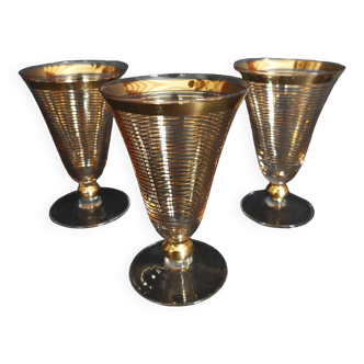 Set of three Hartzviller crystal glasses with golden stripes from the 50s and 60s