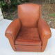 Paire de fauteuils club en cuir