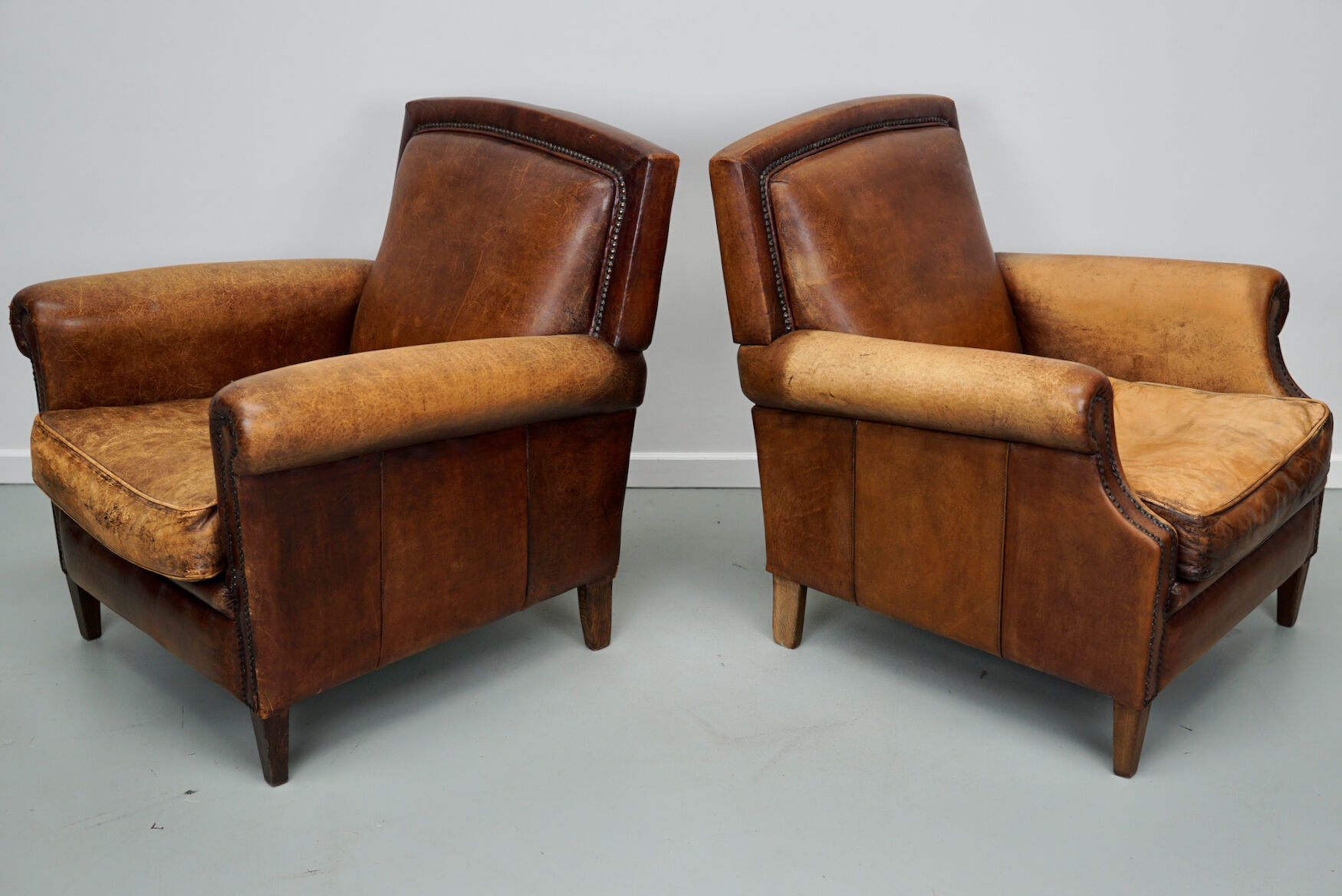 Vintage dutch cognac colored leather club chairs